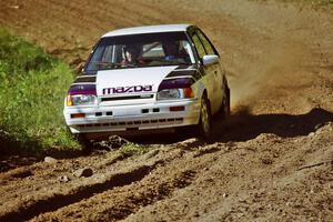 Dennis Ryan / Randy Moore Mazda 323GTX on SS13, Wolf Lake.