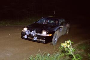 Cal Landau / Eric Marcus Mitsubishi Eclipse GSX on a night stage.