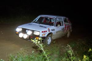 Dave White / Paula Gibeault VW GTI on a night stage.