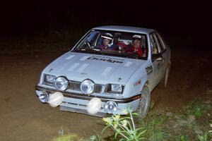 Henry Krolikowski / Cindy Krolikowski Dodge Shadow on a night stage.