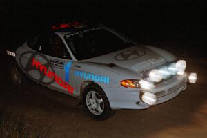 Paul Choinere / Jeff Becker Hyundai Tiburon on a night stage.