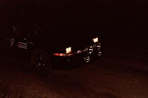 Cal Landau / Eric Marcus Mitsubishi Eclipse GSX on a night stage.