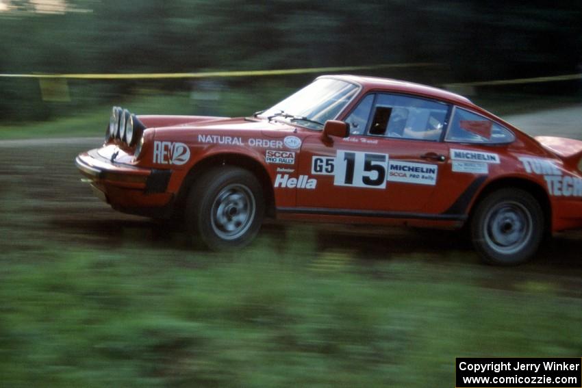 Mike Hurst / Rob Bohn Porsche 911 at the spectator point on SS1, Kabekona.