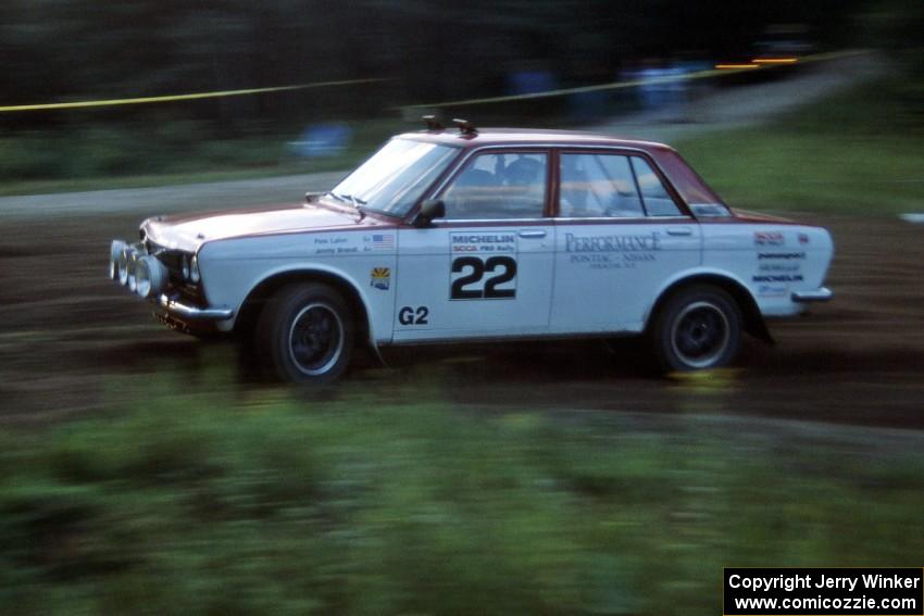 Pete Lahm / Jimmy Brandt Datsun 510 at the spectator point on SS1, Kabekona.