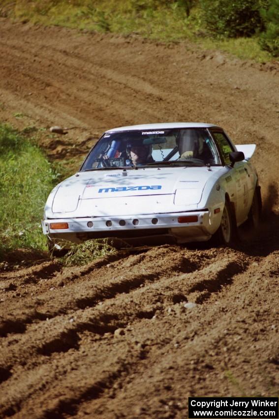 Ted Grzelak / Dan Gildersleeve Mazda RX-7 on SS13, Wolf Lake.