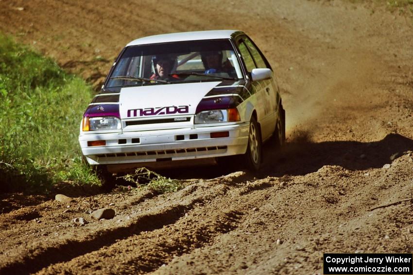 Dennis Ryan / Randy Moore Mazda 323GTX on SS13, Wolf Lake.