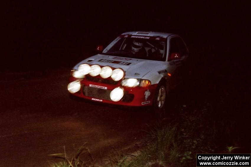 Henry Joy IV / Michael Fennell Mitsubishi Lancer Evo II on a night stage.