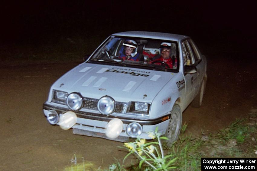 Henry Krolikowski / Cindy Krolikowski Dodge Shadow on a night stage.