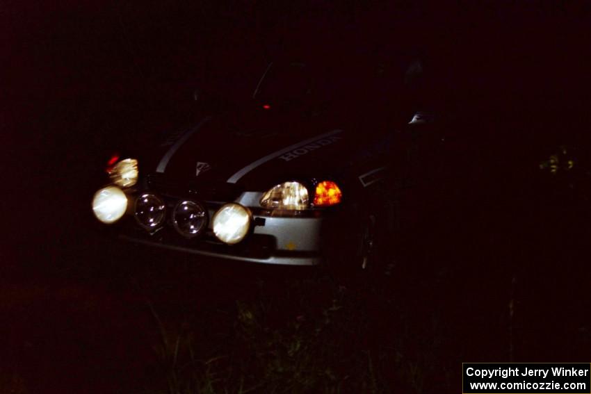 Bryan Hourt / Jay Kowalik Honda Civic on a night stage.