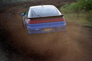 Cal Landau / Eric Marcus throw a wave of gravel at the practice stage in their Mitsubishi Eclipse GSX.