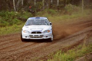Paul Choiniere / Tom Grimshaw set up their Hyundai Tiburon	for a hard right on the practice stage.