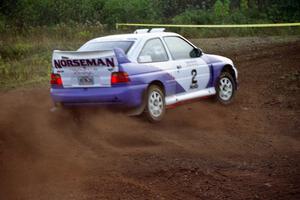 Carl Merrill / Lance Smith drift hard at a right turn on the practice stage in their Ford Escort Cosworth RS.