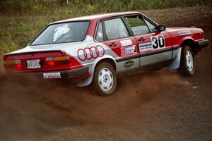 Jon Kemp / Gail McGuire drift their Audi 4000 Quattro hard on the practice stage.