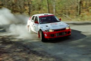 The Henry Joy IV / Michael Fennell Mitsubishi Lancer Evo II near the end of an early morning stage.