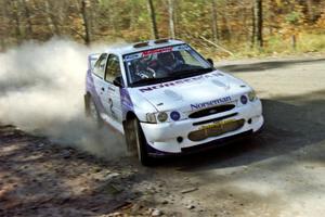 The Carl Merrill / Lance Smith Ford Escort Cosworth RS near the end of a stage in the early morning.