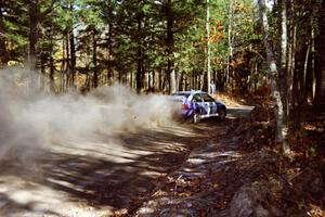 Carl Merrill / Lance Smith drift their Ford Escort Cosworth RS in the morning on SS2.