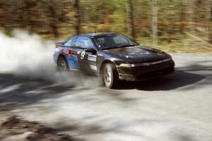 The Cal Landau / Eric Marcus Mitsubishi Eclipse GSX drifts through the final corner of SS2.