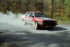 Jon Kemp / Gail McGuire drift their Audi 4000 Quattro through the final sweeper before the finish of SS2.