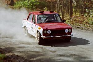 Pete Lahm / Jimmy Brandt drift their Datsun 510 through the final corner of SS2.