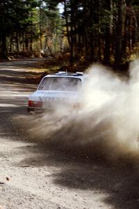 Bill Malik / Farina O'Sullivan throw their Volvo 240 hard into the final corner of SS2.