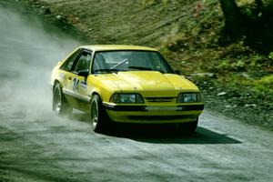 Don Rathgeber / Russ Rathgeber enter into the final corner of SS2 in their Ford Mustang.