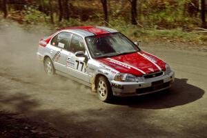 The Brian Shanfeld / Bryan Hourt Honda Civic drifts through the final corner on SS2.