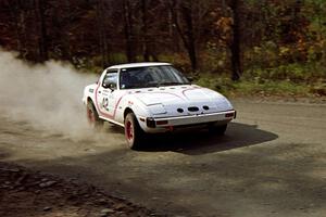 Craig Kazmierczak / Diane Sargent drift their Mazda RX-7 through the final corner of SS2.