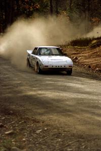 Ted Grzelak / Dan Gildersleeve drift their Mazda RX-7 through a corner near the end of SS2.