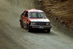 Jim Buchwitz / C.O. Rudstrom drift their Mercury Lynx through a sweeper near the end of SS2.