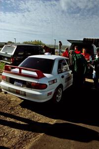 The Henry Joy IV / Michael Fennell Mitsubishi Lancer Evo II comes in for service.