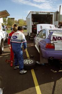 Carl Merrill chats with Cindy Krolikowski beside the Ford Escort Cosworth he and Lance Smith shared.