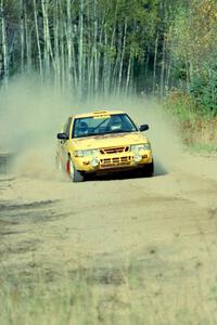 Sam Bryan / Rob Walden blast their SAAB 900 Turbo away from the start of Menge Creek I.