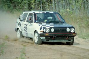 The two-tone VW GTI of Richard Losee / Kent Livingston near the start of Menge Creek I.