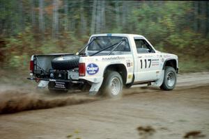 Ken Stewart / Doc Shrader drift their Chevy S-10 through the first corner of Menge Creek I.