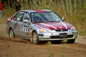 The Brian Shanfeld / Bryan Hourt Honda Civic drifts through the first corner of Menge Creek I.