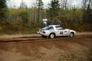 Ted Grzelak / Dan Gildersleeve drift their Mazda RX-7 through the first sweeper on Menge Creek I.