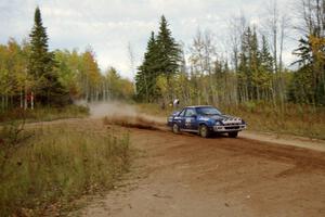 The Brian Scott / David Watts Dodge Shelby Charger drifts through the first corner of Menge Creek I at speed.