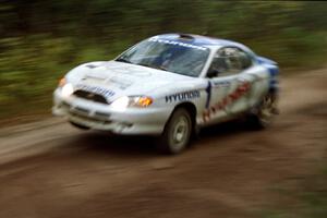 Paul Choiniere / Tom Grimshaw caught a little air at the culvert near the end of Menge Creek II in their Hyundai Tiburon.