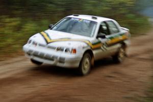 Tom Ottey / Pam McGarvey at speed on Menge Creek II in their Hyundai Elantra.