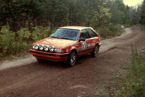 Gail Truess / Nancy Redner at speed in their Mazda 323GTX near the finish of Menge Creek II.