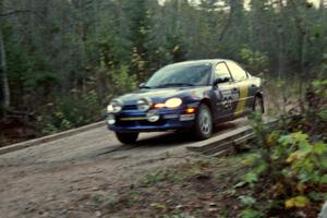 Al Kaumeheiwa / Craig Sobczak cross the final bridge of Menge Creek II in their Dodge Neon.