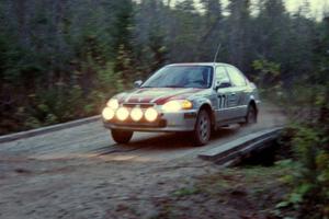 Brian Shanfeld / Bryan Hourt cross the final bridge on Menge Creek II in their Honda Civic.