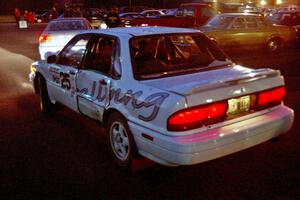 The damaged Mitsubishi Galant VR-4 of Bill Driegert / Hishin Shim pulls into service.-