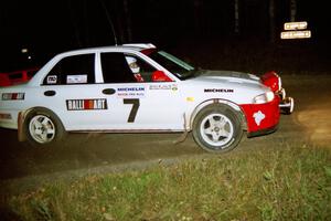 The Henry Joy IV / Michael Fennell Mitsubishi Lancer Evo II sets up for a 90-right.