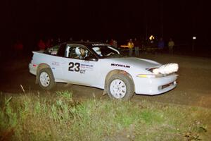 Chris Czyzio / Eric Carlson are set up for a 90-right at night in their Mitsubishi Eclipse GSX.