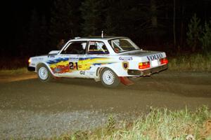 Bill Malik / Farina O'Sullivan throw their Volvo 240 through a 90-right at night.