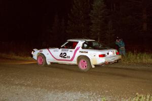 Craig Kazmierczak / Diane Sargent drift their Mazda RX-7 through a 90-right at night.