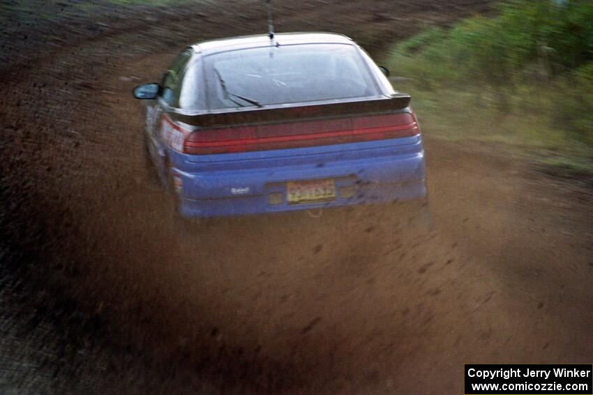 Cal Landau / Eric Marcus throw a wave of gravel at the practice stage in their Mitsubishi Eclipse GSX.
