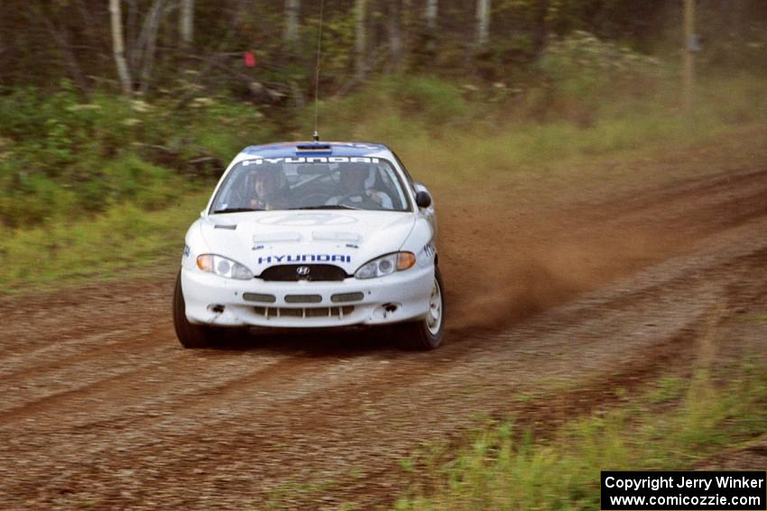 Paul Choiniere / Tom Grimshaw set up their Hyundai Tiburon	for a hard right on the practice stage.