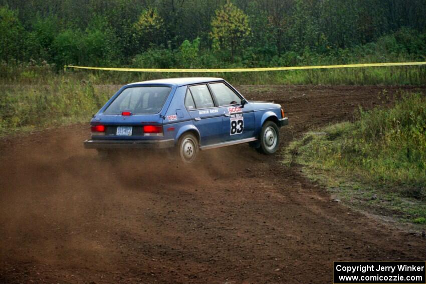 Mark Utecht / Paul Schwerin drift their Dodge Omni GLH-Turbo hard at a right turn on the practice stage.